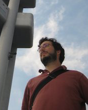 Photo of Daniel Levinson, with blue sky in background